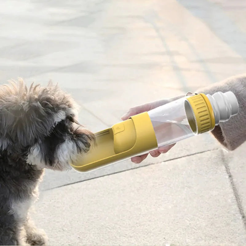 Portable dog water bottle with built-in travel bowl in dark blue, white, or yellow colours