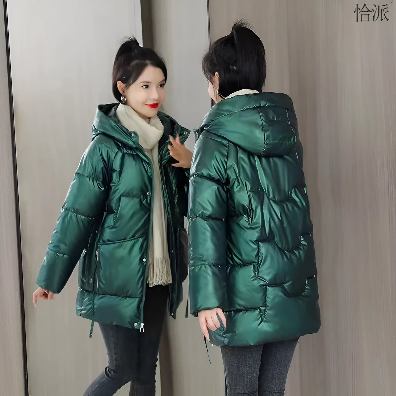 Women's loose thick hooded winter jacket in black, shown on a model.