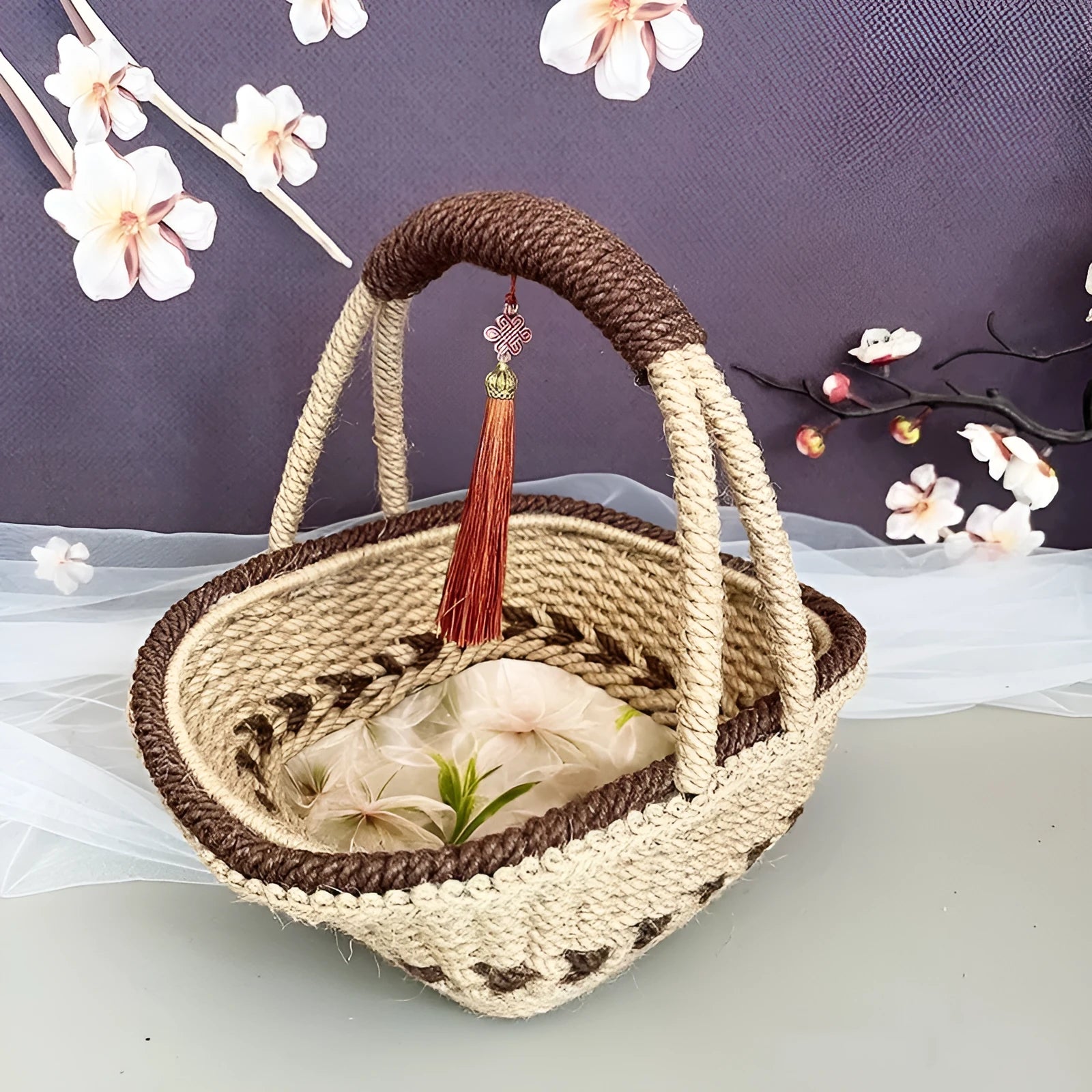 Hand-woven straw basket made from hemp rope, measuring 19cm tall and 12cm wide.