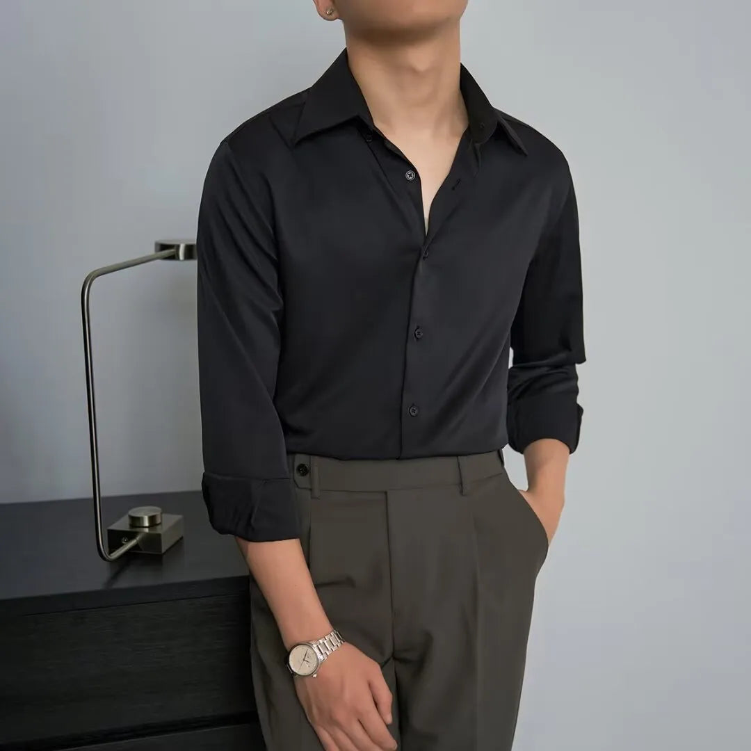 Man wearing a black loose-fit long sleeve cardigan shirt with a V-neck in Korean Japanese style.