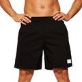 Men's quick-drying nylon shorts in solid colours with straight leg opening for beach and sports