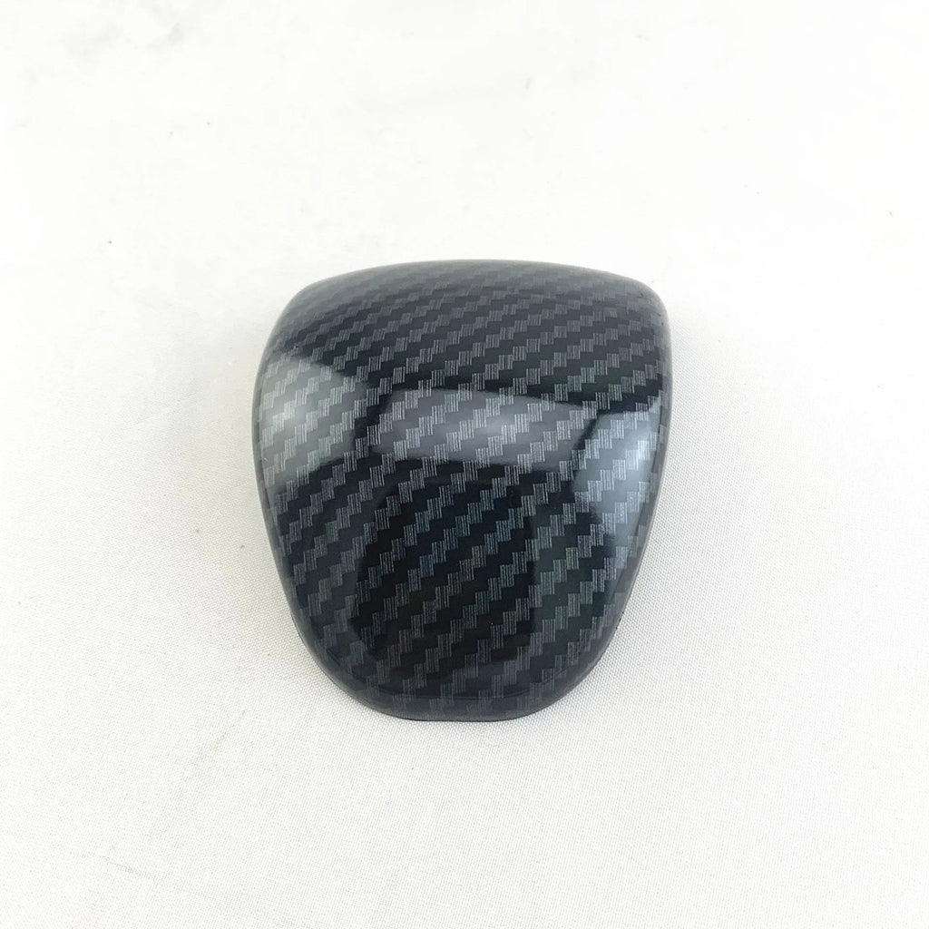 Carbon fibre pattern gear shift knob cover for smart Runk3 car interior.
