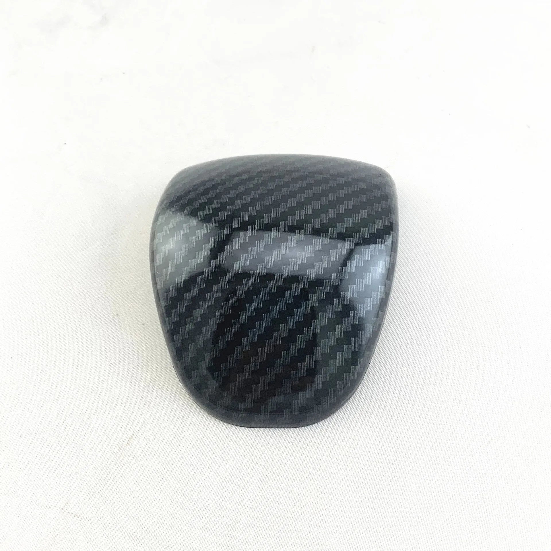 Carbon fibre pattern gear shift knob cover for smart Runk3 car interior.