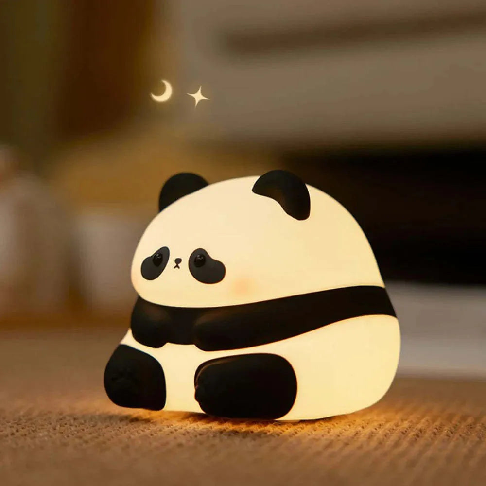 Cartoon panda-shaped night light with soft silicone construction and warm white LED glow