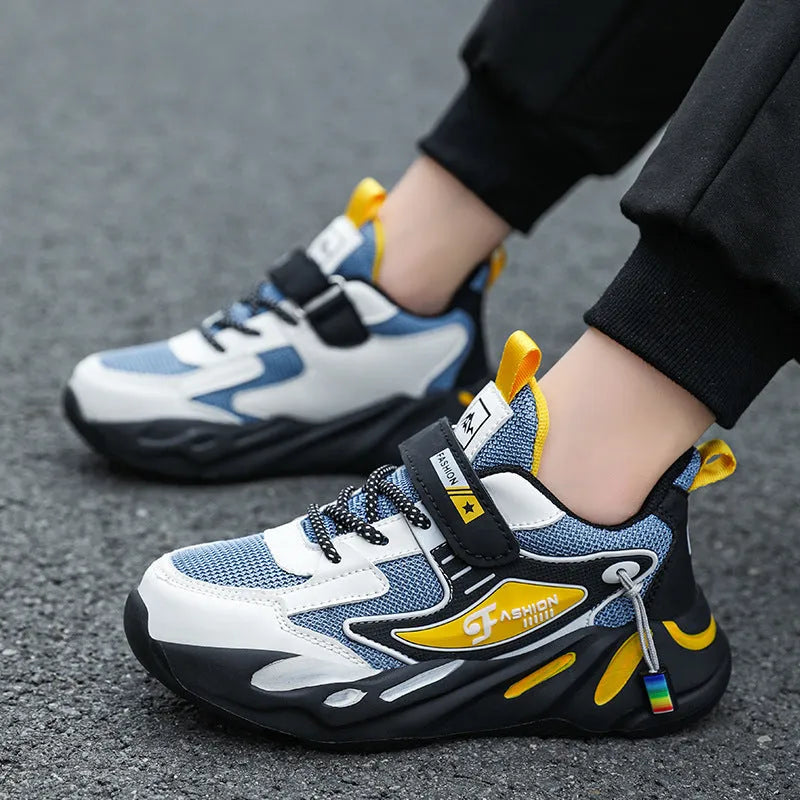Boys' platform sports running shoes in dark blue with Velcro strap and mesh upper.