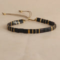 Geometric glass pull bead bracelet in five colour options on wrist