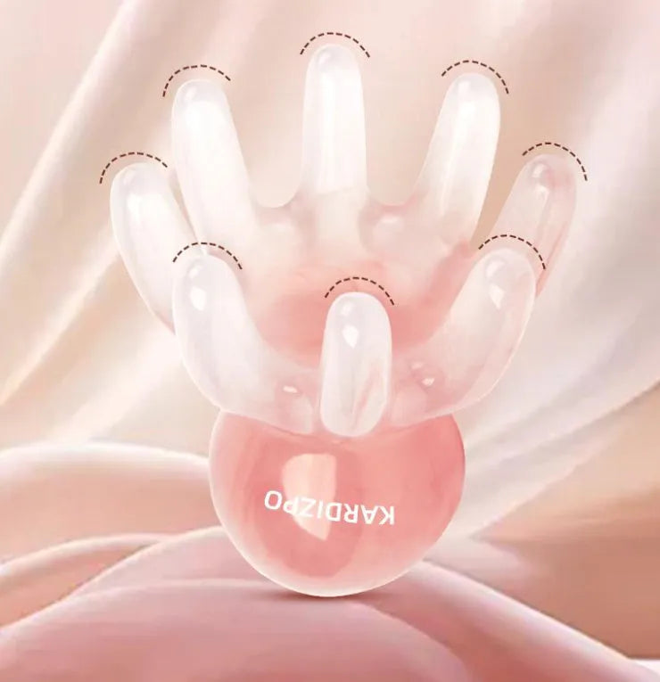 Pink natural resin octopus-shaped massage comb for periocular meridian relief with storage bag.