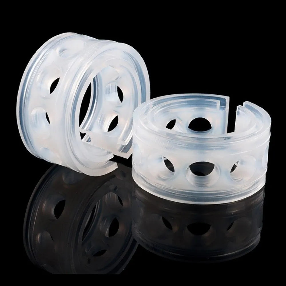 Two transparent rubber spring shock absorbers for car modification, shown with size chart.