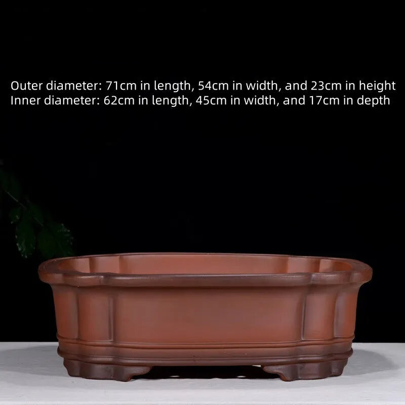 Large antique-finish Chinese purple clay flowerpot shaped like a tree stump with decorative carvings.