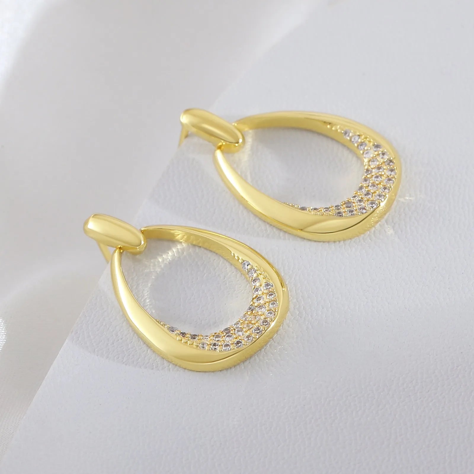 Yellow gold geometric drop earrings for women with zircon details, measuring 2.6cm by 1.7cm.