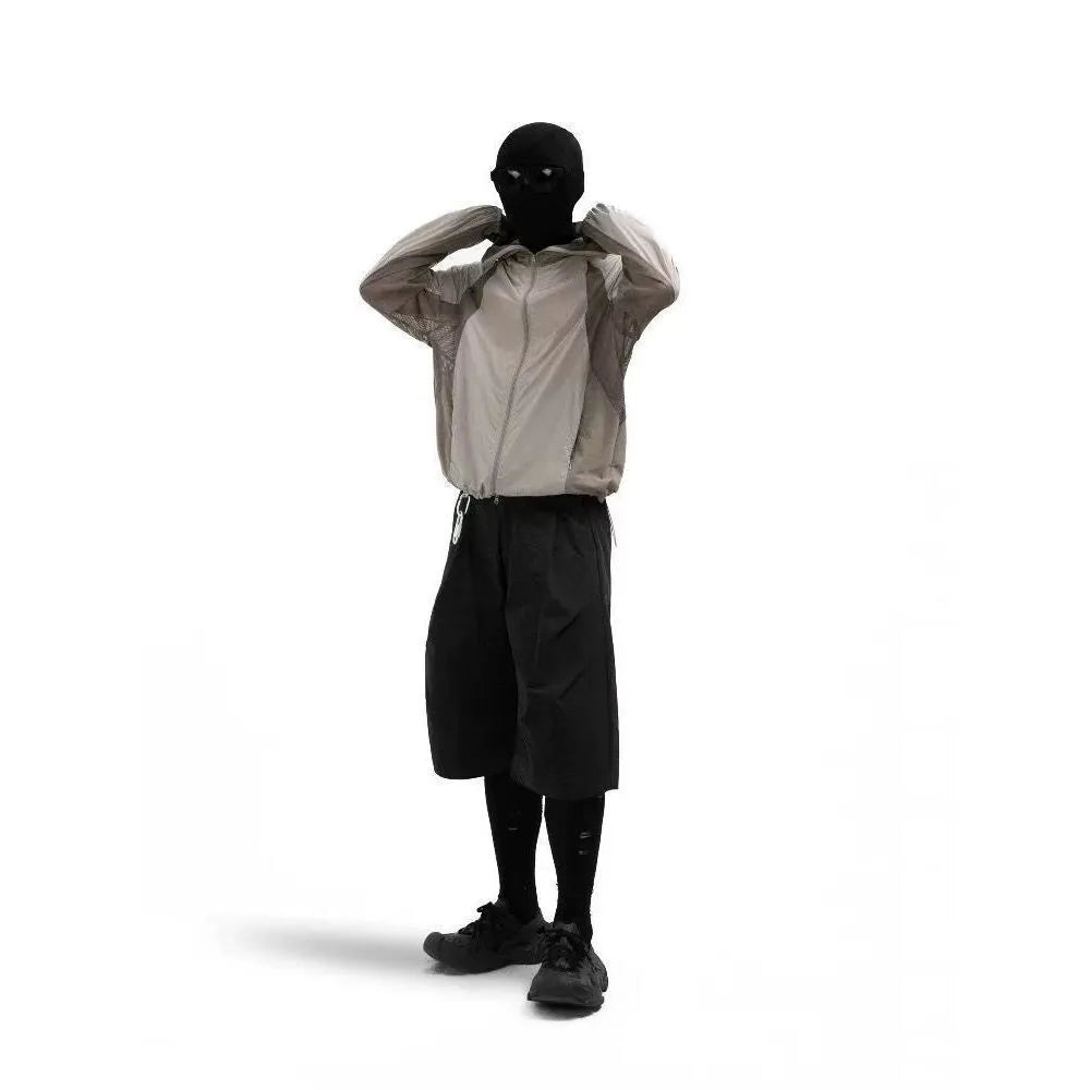 Mesh stitching sun protective nylon top in desert brown, showing regular length and construction.
