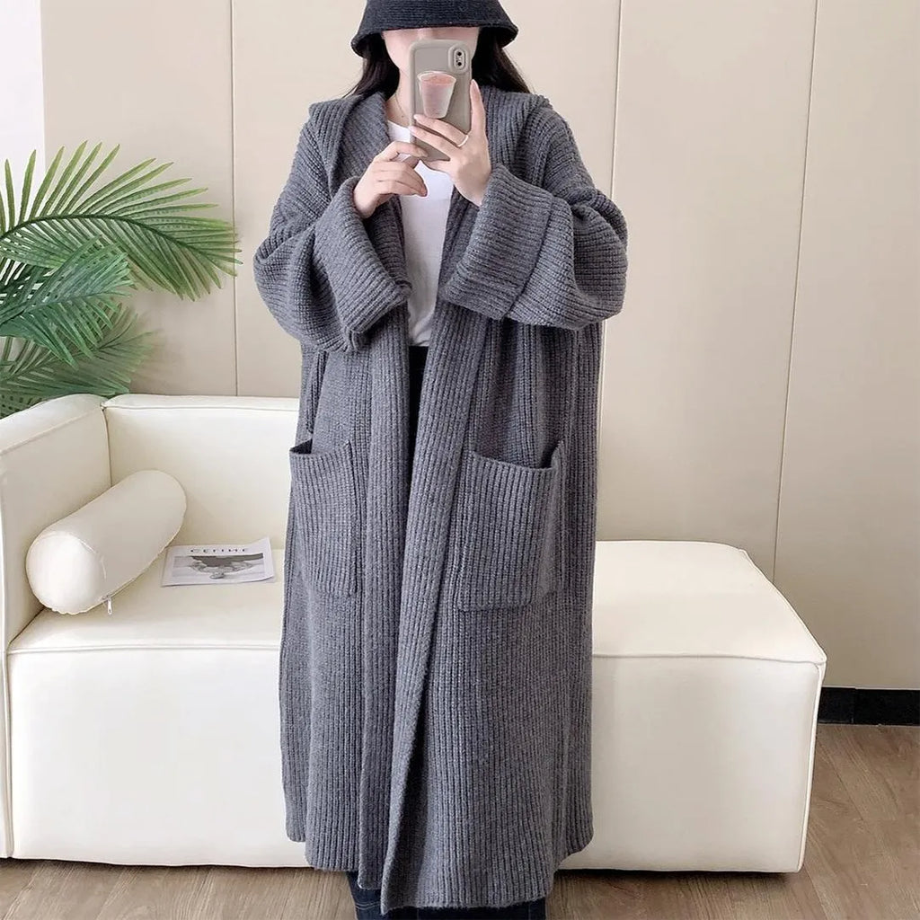 Women's loose hooded cardigan coat in acrylic fibre with extended length and raglan sleeves