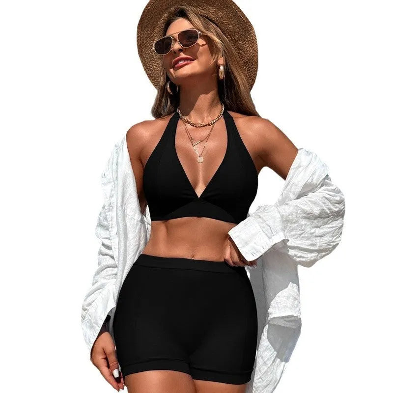 Women's split style bikini swimsuit set for swimming in black colour