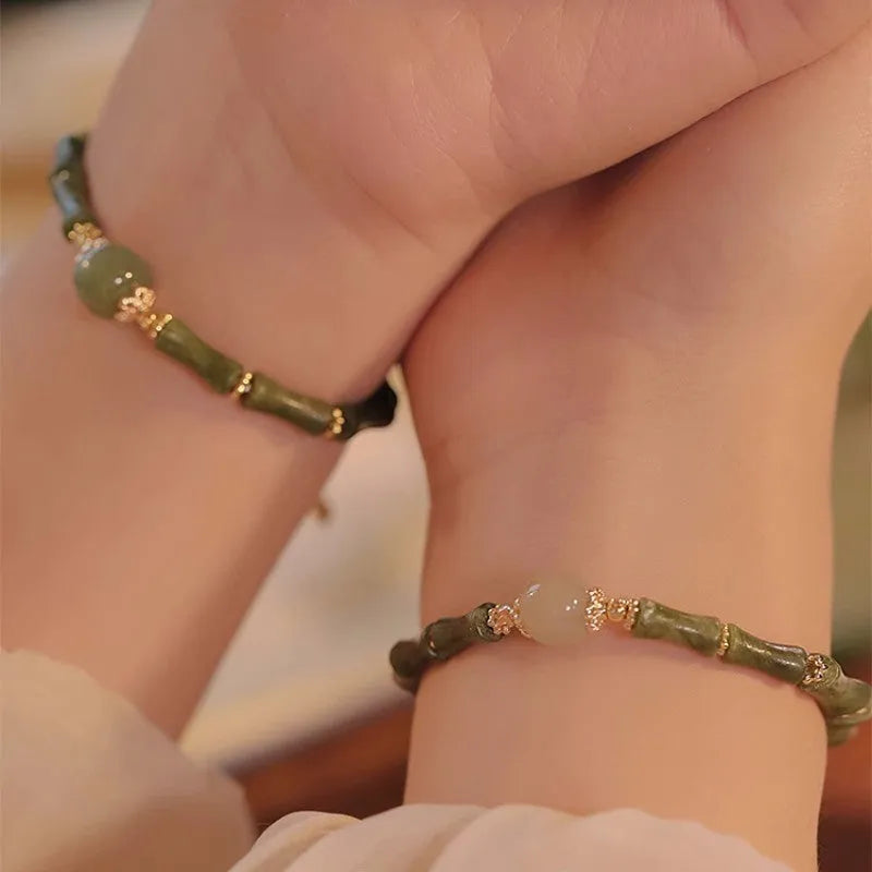 Simple geometric Hetian jade bracelet for women with round beads in dark green and light colour options.
