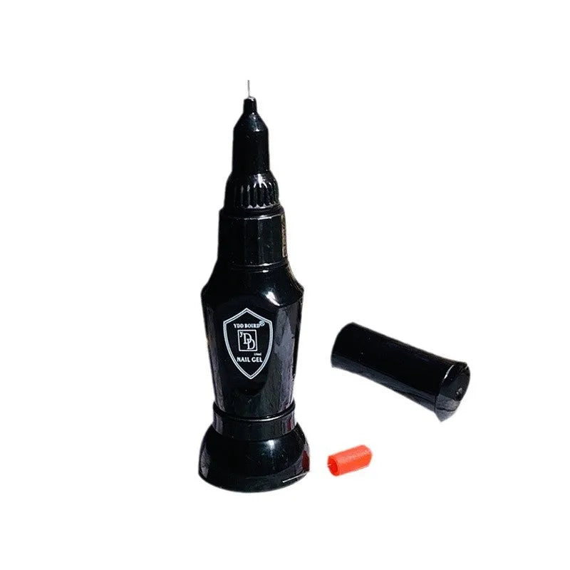 Nail art no-wash gem glue bottle with three iron tube dotting pens on black background