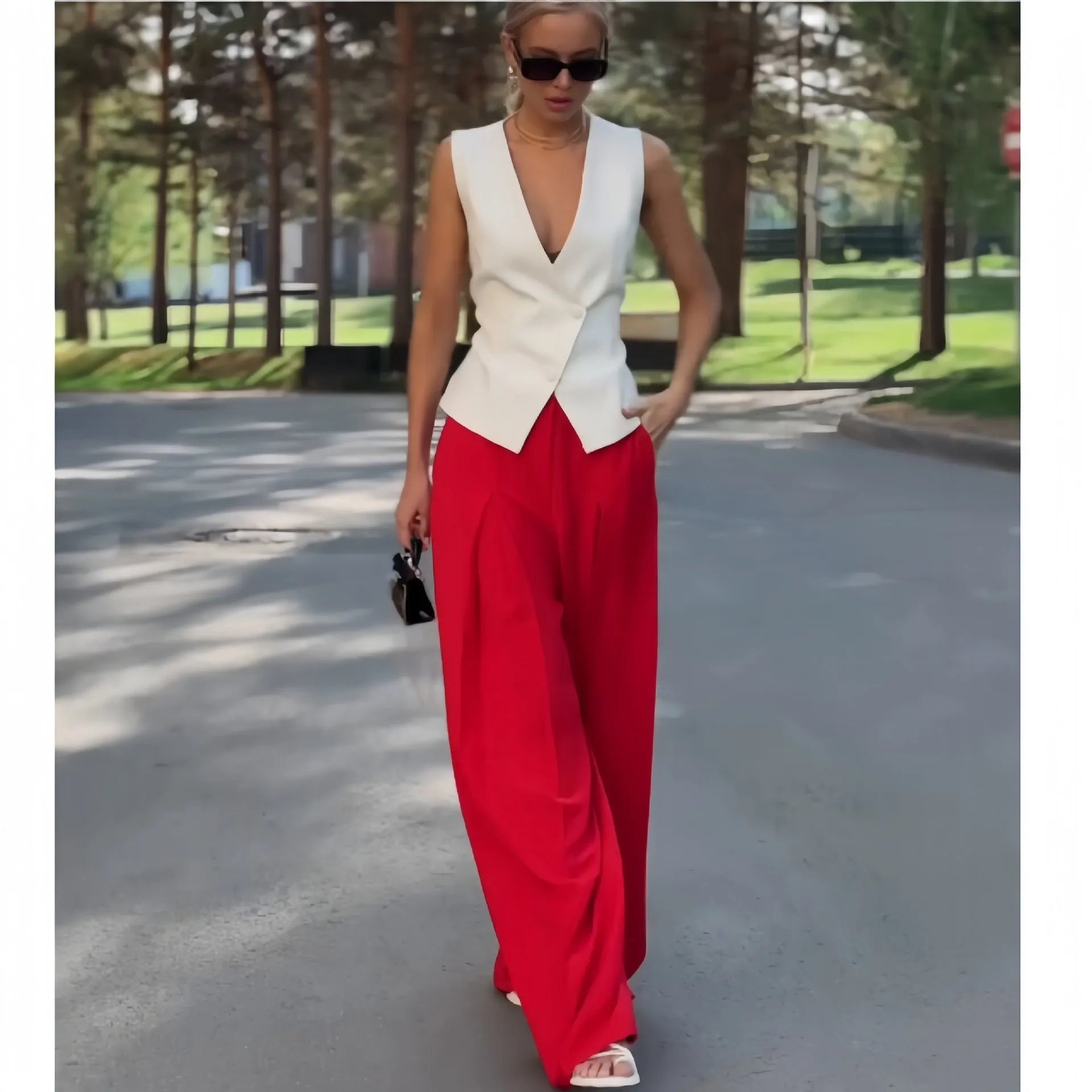 Women's beige polyester two-piece set with deep V-neck sleeveless top and high-waist wide-leg trousers