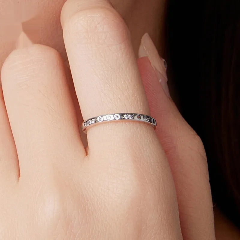 Moss Password I Love You silver ring with oxidised black finish, showing the engraved text.