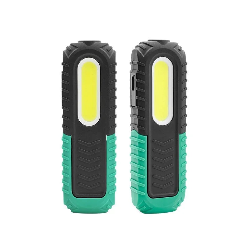 Black and green USB-charged automotive inspection work light with compact design