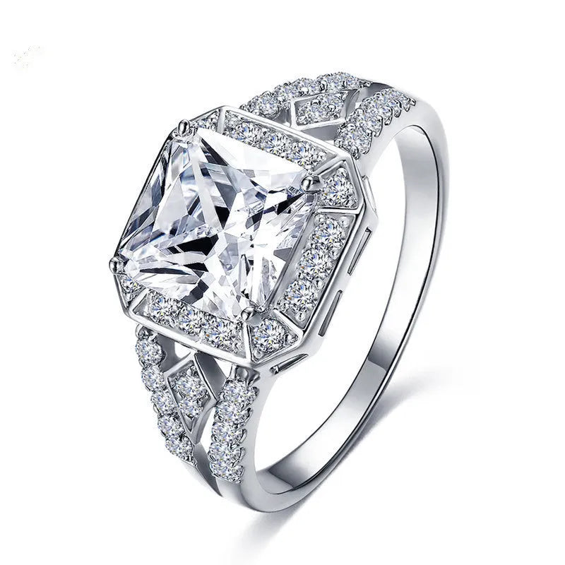 Platinum geometric zircon ring with hollow quadrilateral design on copper base