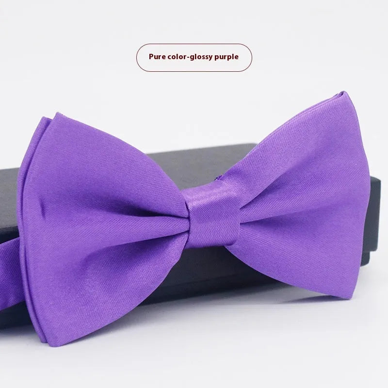 Men's flat head solid colour bow tie in polyester, showing 12cm by 6cm size on a background.