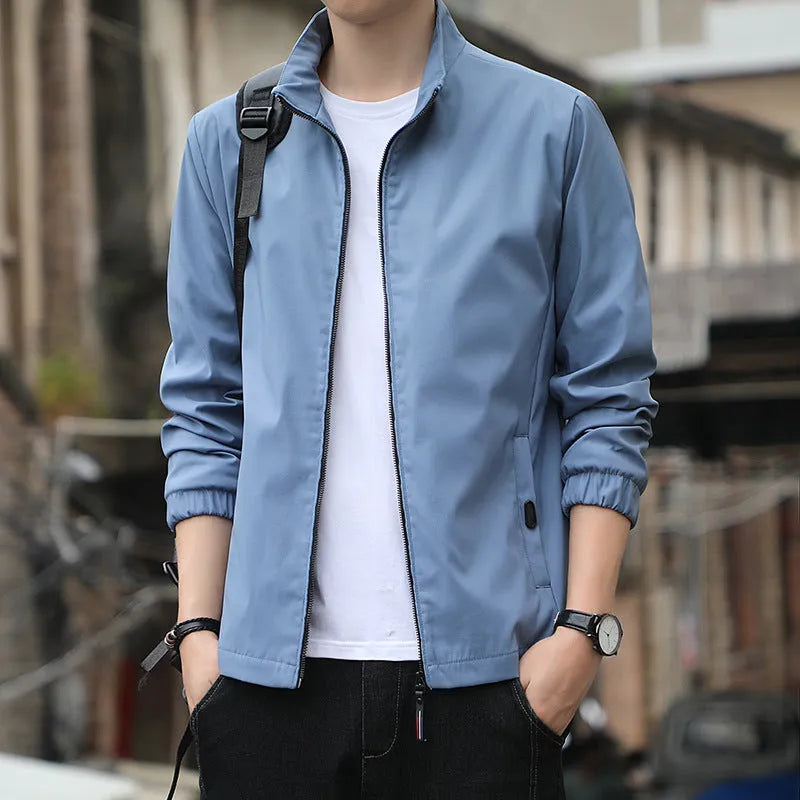 Korean style loose fit thin autumn jacket in blue with lapel collar and zip pockets.