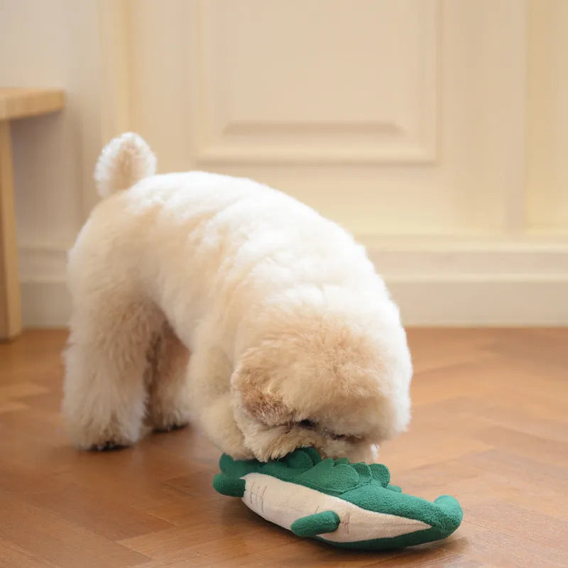 Green plush toy dog measuring 35cm long by 18cm wide