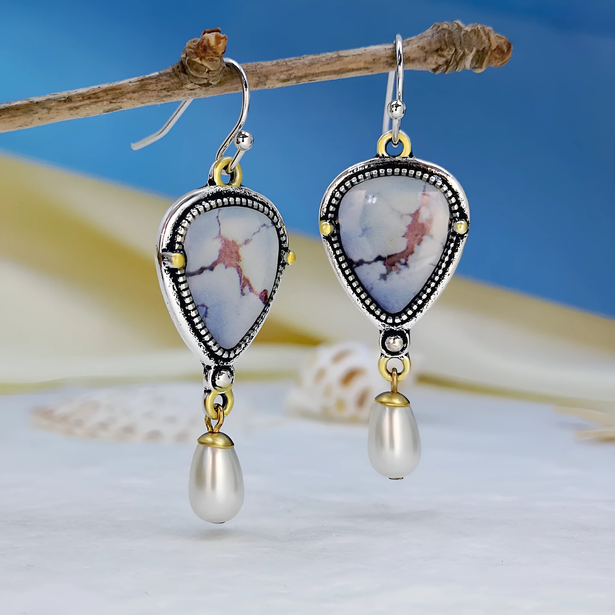 Retro blue geometric drop earrings with synthetic opal and pearl details