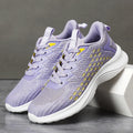 Women's lavender purple Flyknit running shoes with striped pattern and mesh lining