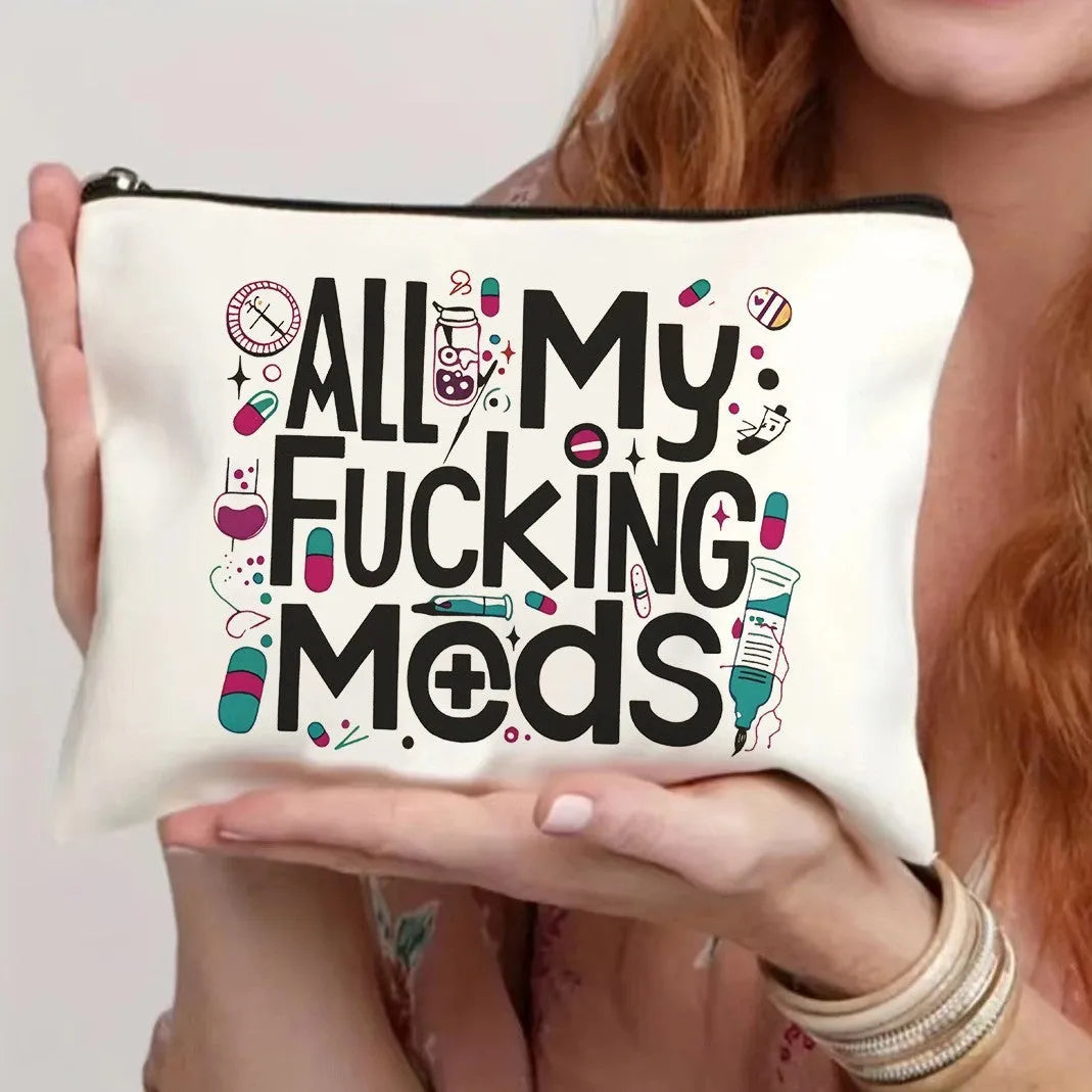 Canvas-style polyester cosmetics bag with a zipper, shown in multiple colour options.