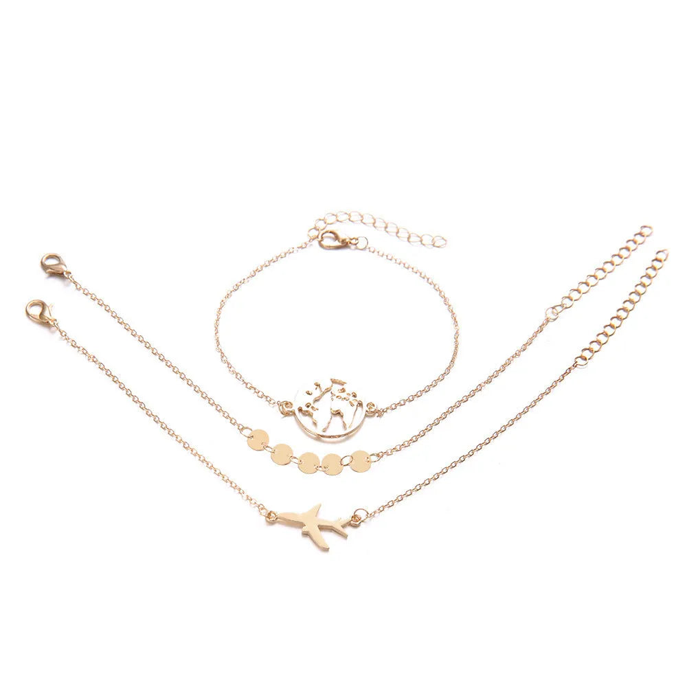 Three Bohemian-style bracelets with aircraft map charms and heart shapes in electroplated alloy