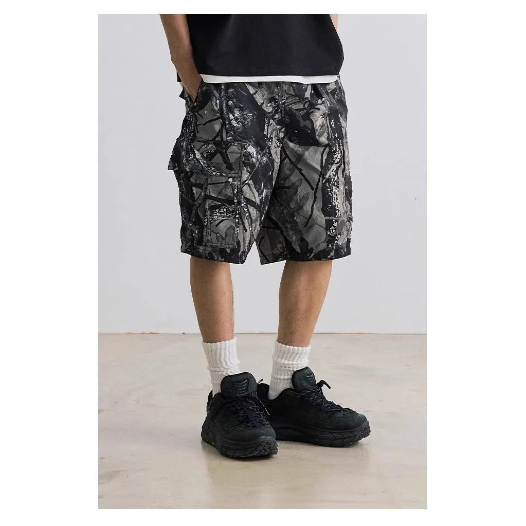 Straight-leg denim shorts in black or army green with mid-waist design and zip fly