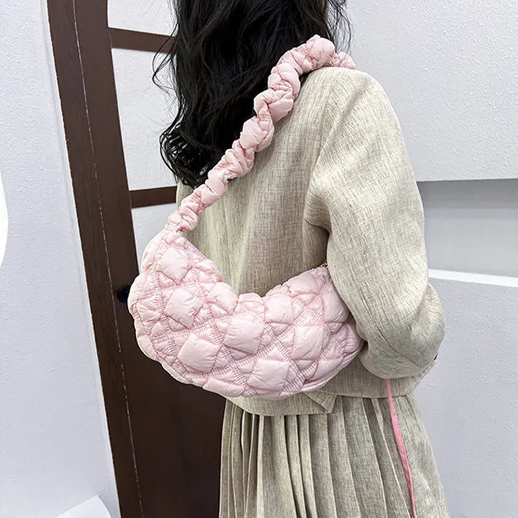 Women's casual nylon messenger bag in beige colour, showing front view with shoulder strap.