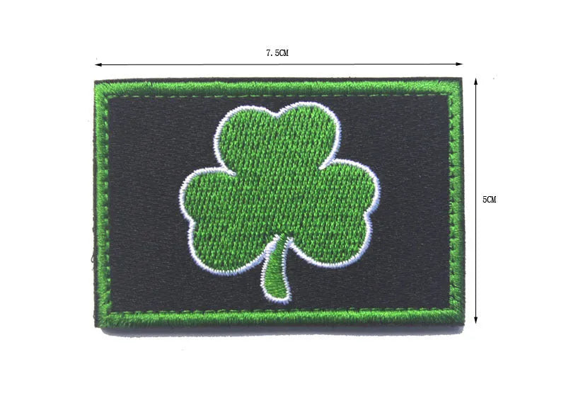 Outdoor embroidered fabric badge with Velcro backing on a tactical vest.