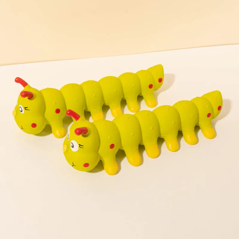 Yellow caterpillar-shaped rubber dog toy with squeaker for small and medium breeds