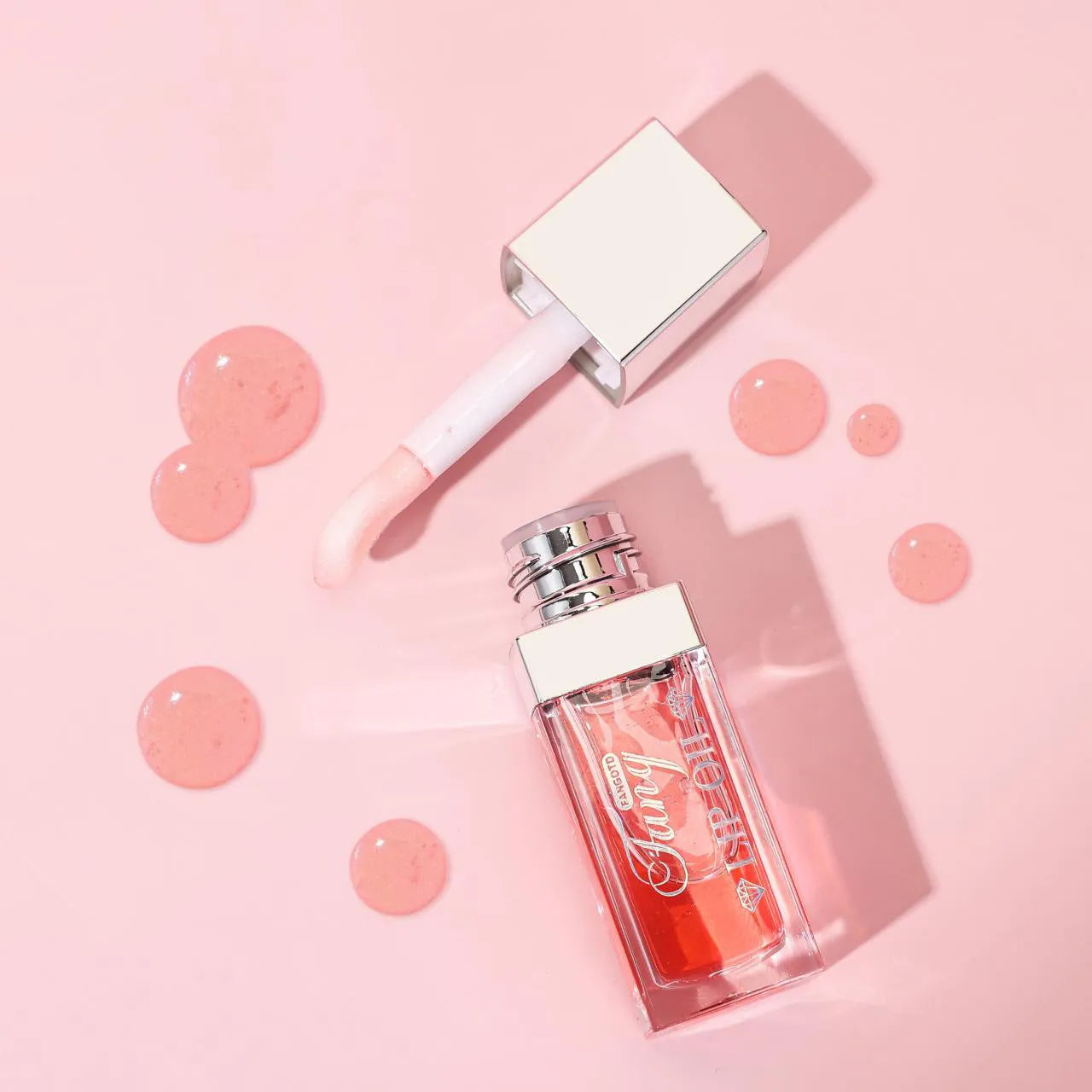Five colour options of bright lip gloss mint lipstick with moisturising lip essence oil applicator