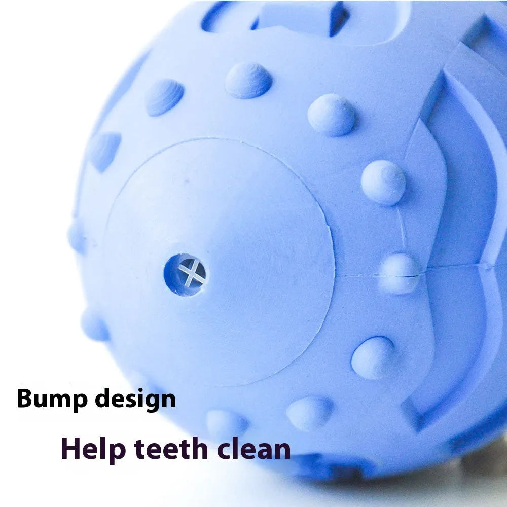 Light green rubber rugby ball dog toy with textured surface for teeth cleaning