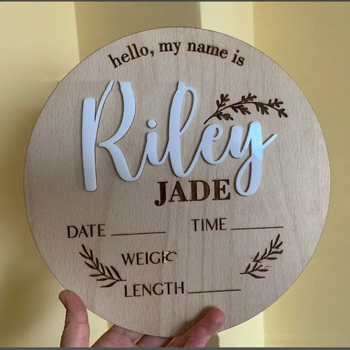 Square wooden baby name plaque showing newborn birth information, 15cm on each side.
