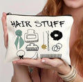 Canvas-style polyester cosmetics bag with a zipper, shown in multiple colour options.