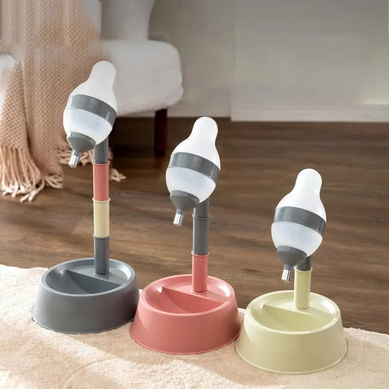 Green height-adjustable pet water dispenser with detachable pole and weighted bowl on a floor.