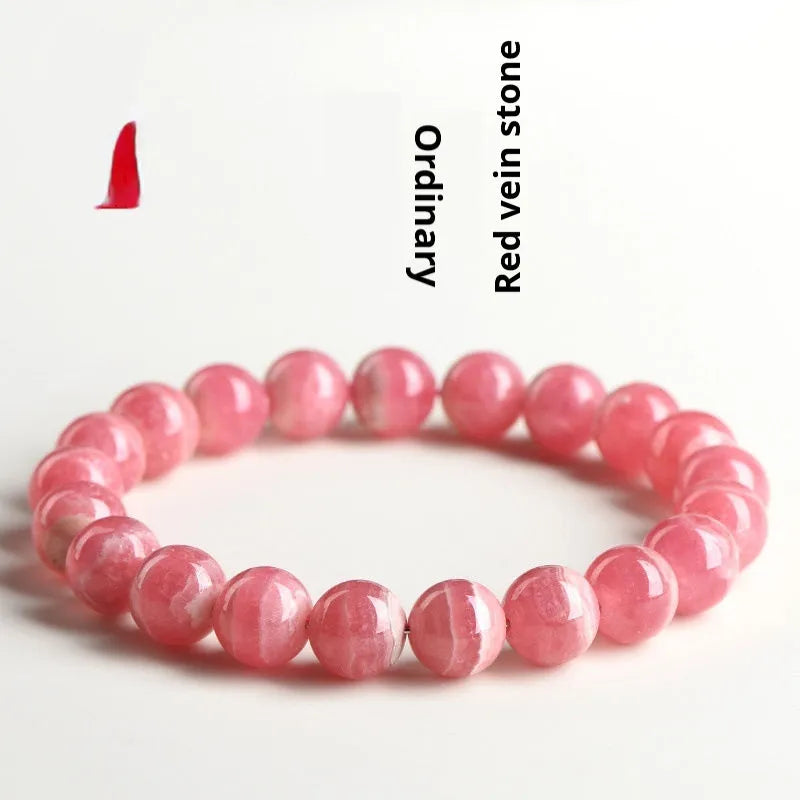 Women's geometric crystal bracelet with natural red patterned stone beads and longevity lock design element