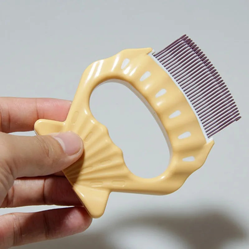 Shell-shaped plastic pet grooming brush with bent wire bristles, anti-slip handle in green colour