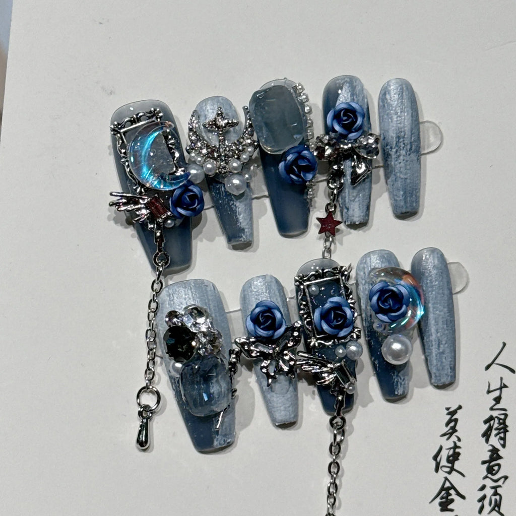 Blue manicure nails with rose tulip floral pattern in plastic armour construction