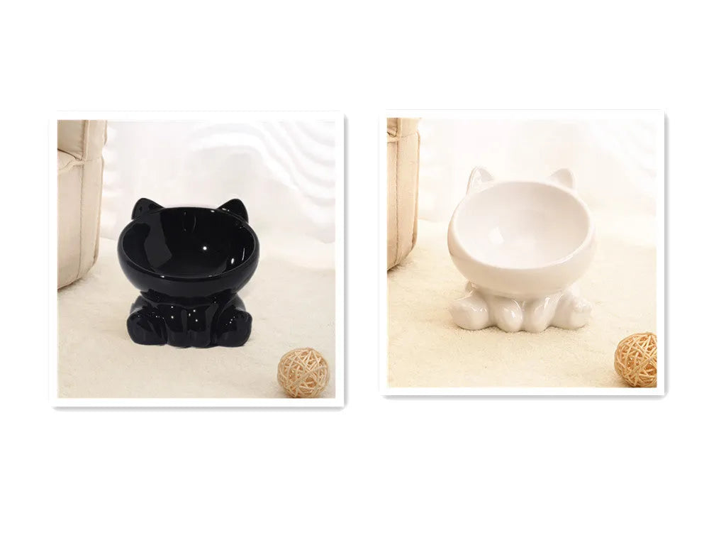 Ceramic cat bowl with neck guard in black and white and pink and blue colour options on a white background