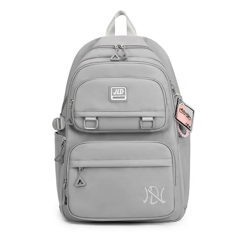 Girls large capacity nylon school backpack in purple with waterproof anti-theft features and breathable back panel