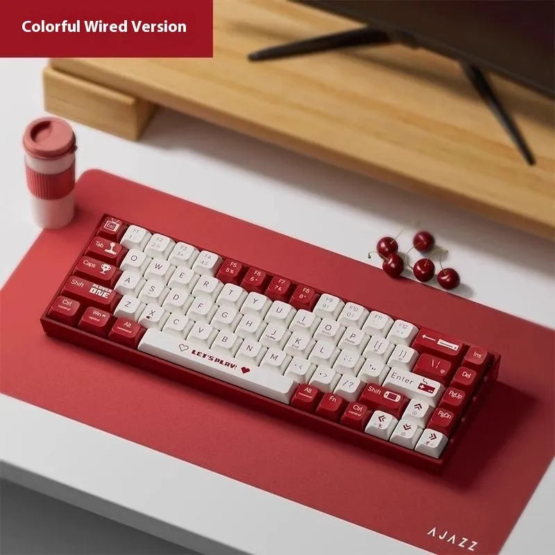 AJAZZ AK680 wired mechanical keyboard with red and white keycaps on a desk.
