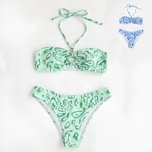 Green floral bandeau bikini swimsuit with split design on a mannequin