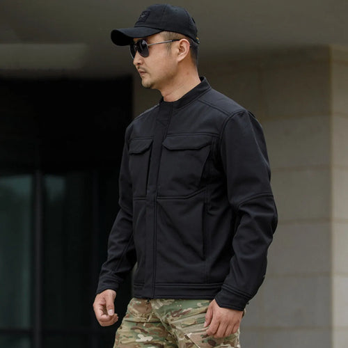 Bone Frog Peak Breaker soft shell tactical jacket in black, shown for outdoor mountaineering use.