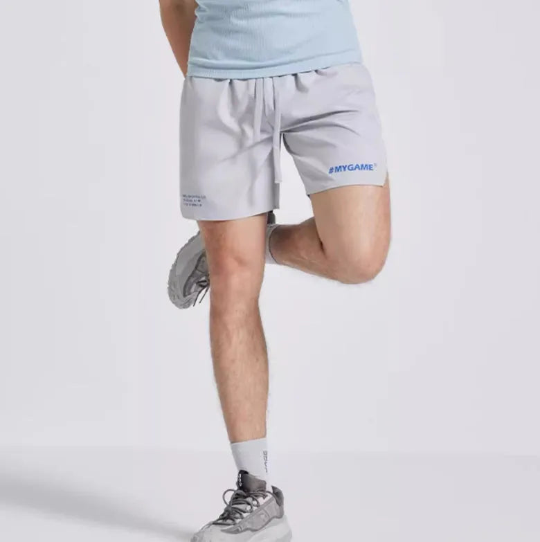 Men's fitness training shorts in midnight blue with moisture-wicking fabric and four-point stretch construction