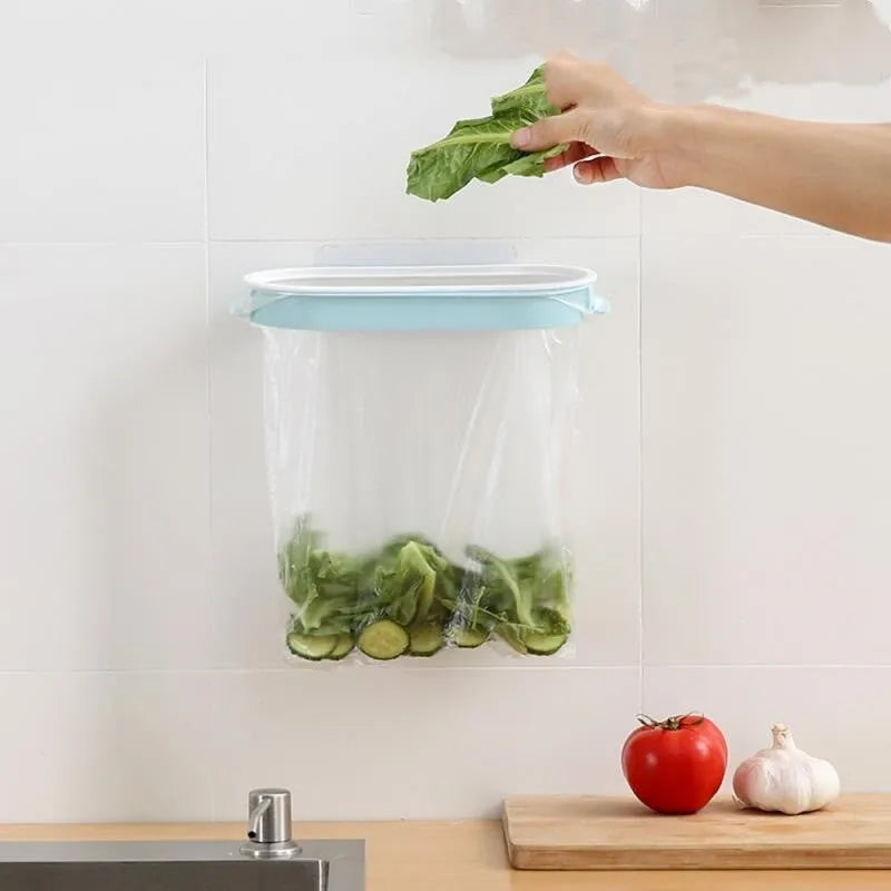 Blue plastic garbage bag storage rack mounted under a kitchen cabinet.