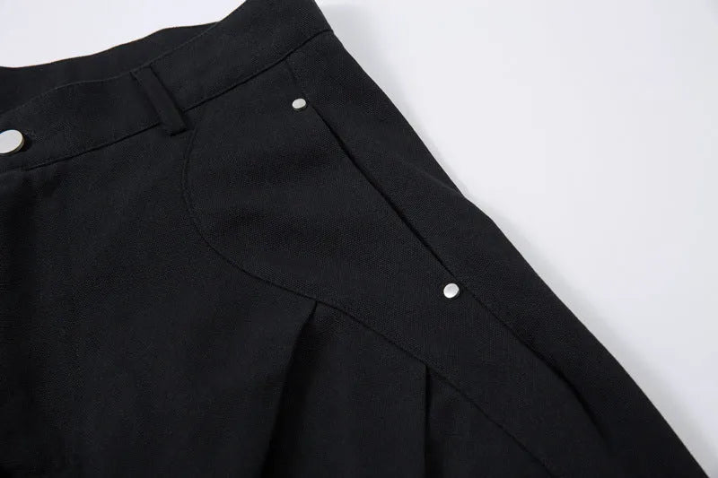 Men's black pleated machete casual trousers with loose-fitting wide-leg design and cotton fabric